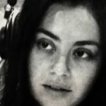 Charli XCX in the studio wearing headphones during the Music, Fashion, Film sessions