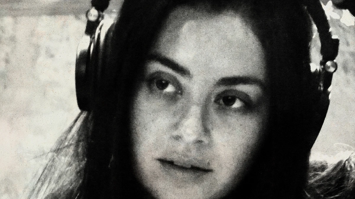 Charli XCX in the studio wearing headphones during the Music, Fashion, Film sessions